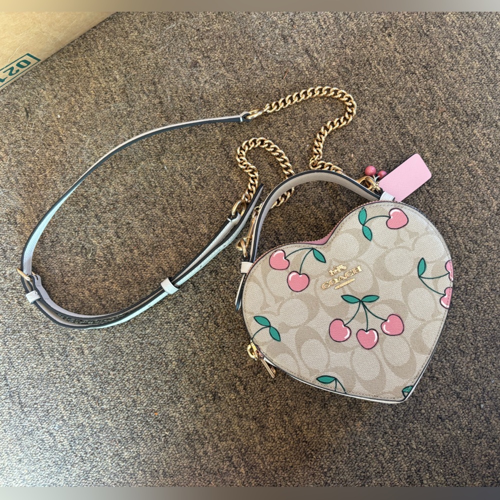 Coach heart shaped cherry crossbody bag with detachable strap